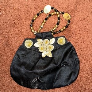 Black floral hand purse